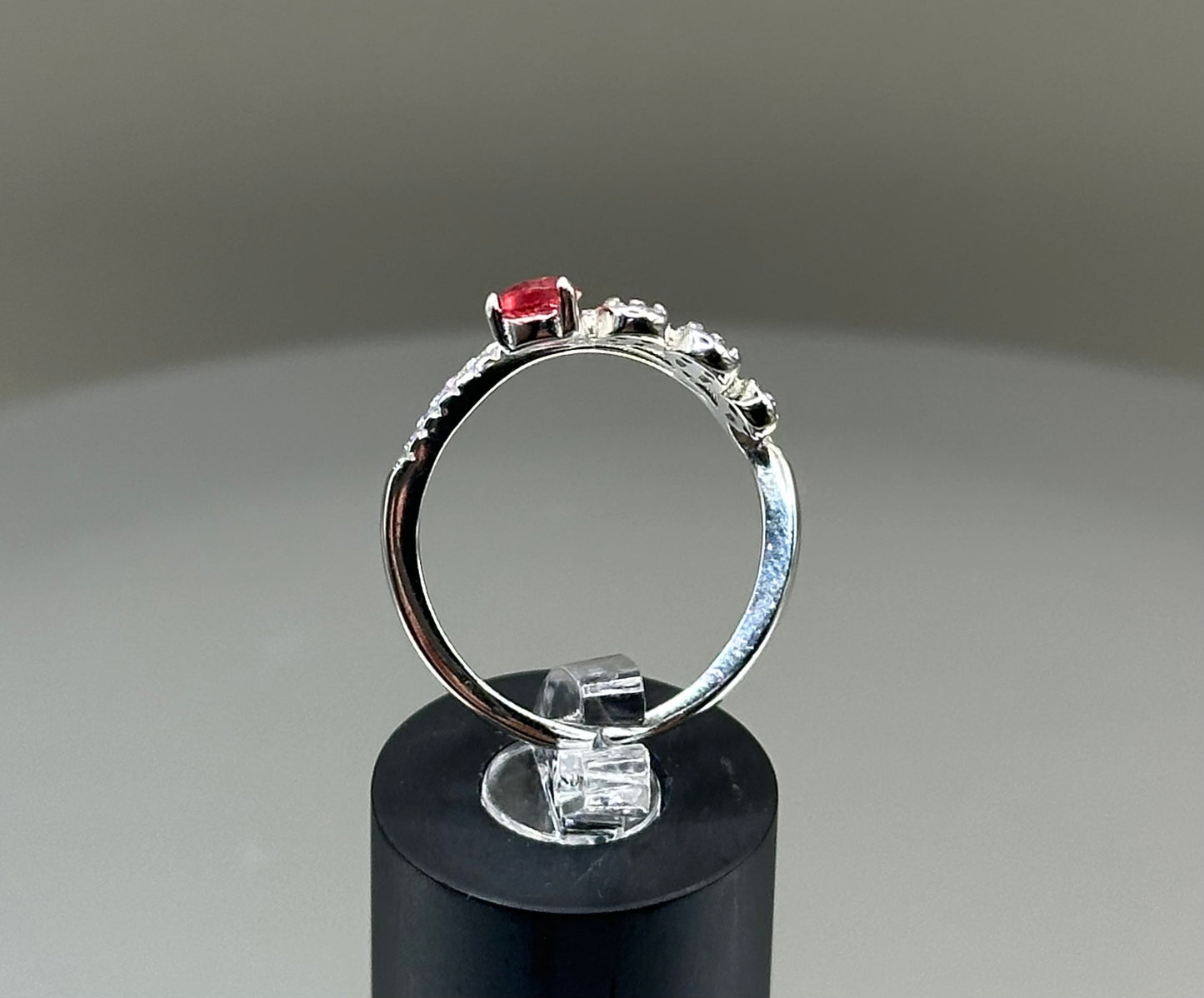 Silver ring with white and pink CZ