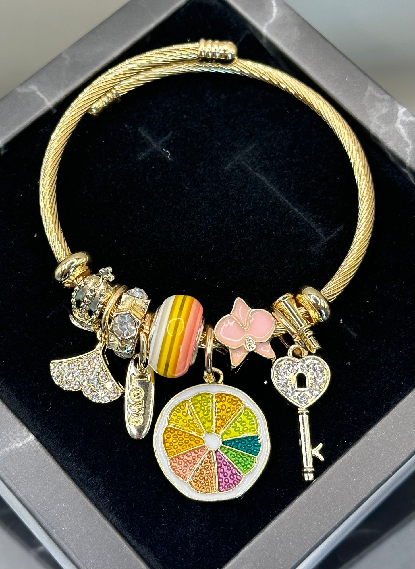 Gold-plated adjustable Bracelet with Charms