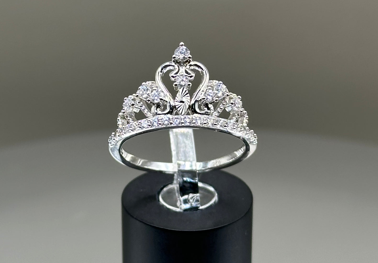 Silver ring with crown design