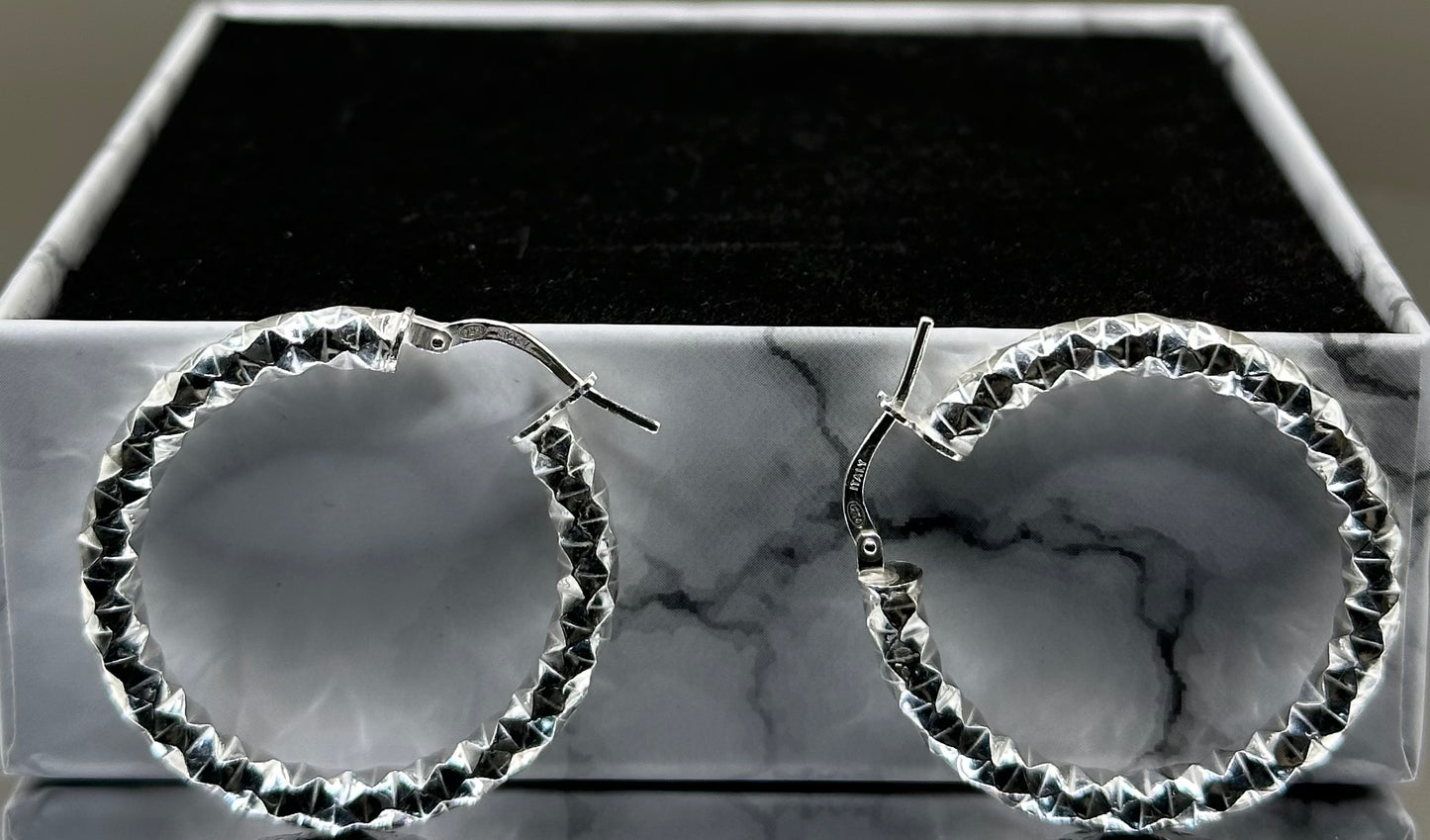 Silver diamond cut hoop earrings