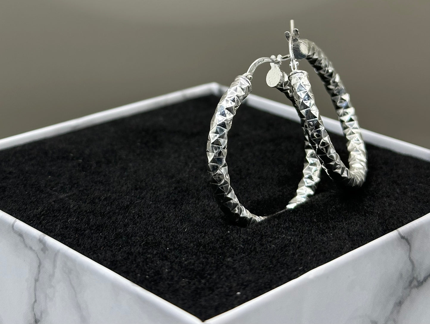 Silver diamond cut hoop earrings